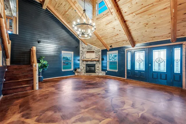 a view of a porch with wooden floor and roof