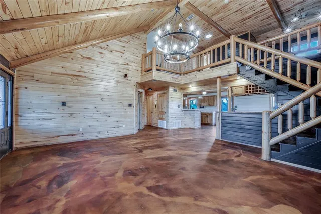 a kitchen with a sink and wooden cabinets