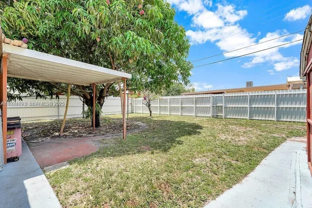 a view of a porch with wooden floor and a porch