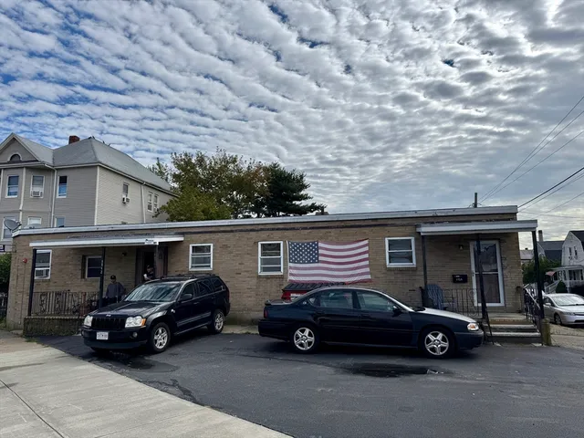 a car parked in front of a house