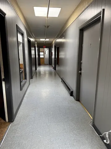 a view of gallery with windows