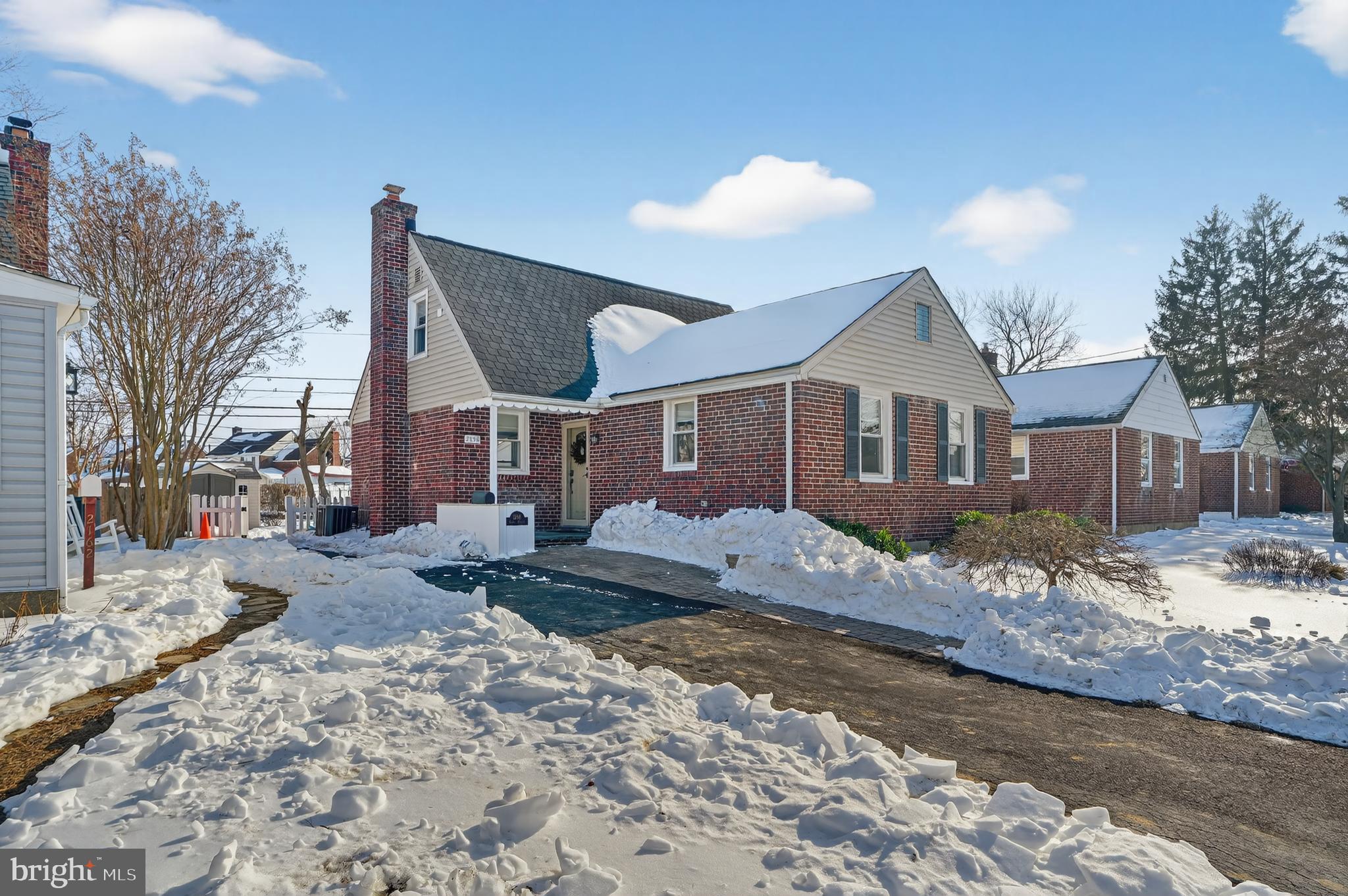 2158 6th Avenue Morton, PA 19070 - Photo 2 of 36 a view of a house with a snow on the road