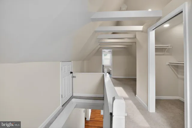 a view of walk in closet with window