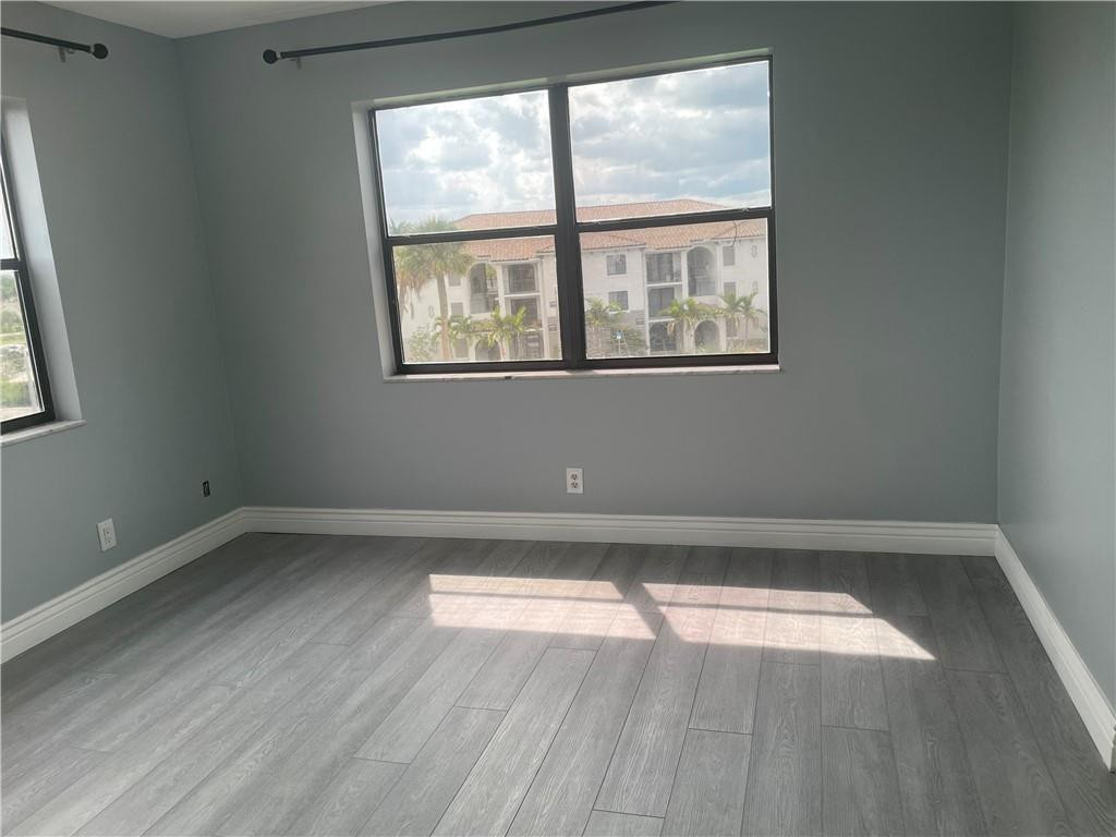 9355 Southwest 8th Street, Unit 401 Boca Raton, FL 33428 - Photo 10 of 16 MASTER SUITE