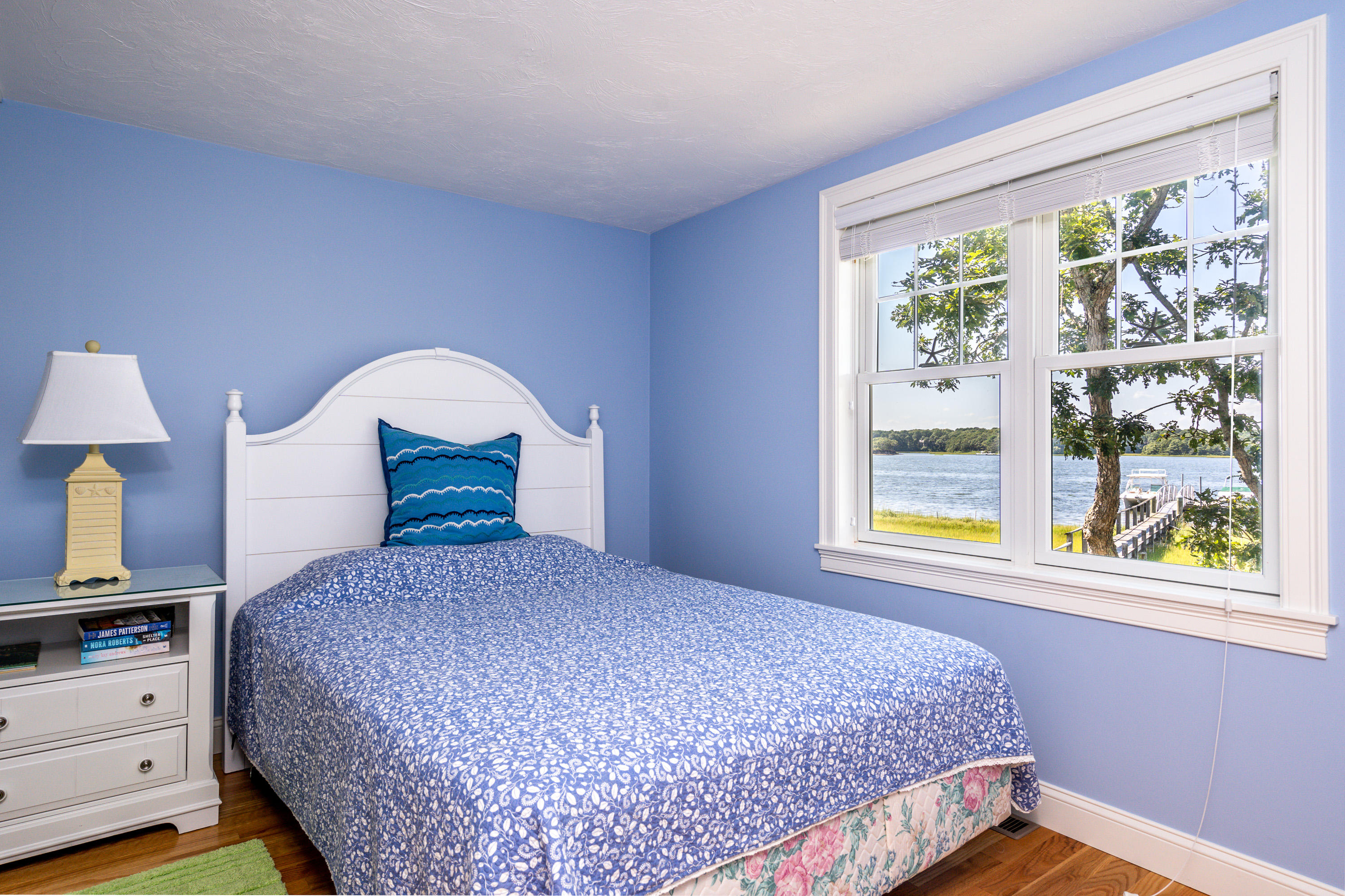 17 Monomoscoy Road West Mashpee, MA 02649 - Photo 14 of 36 a bedroom with a bed and a window