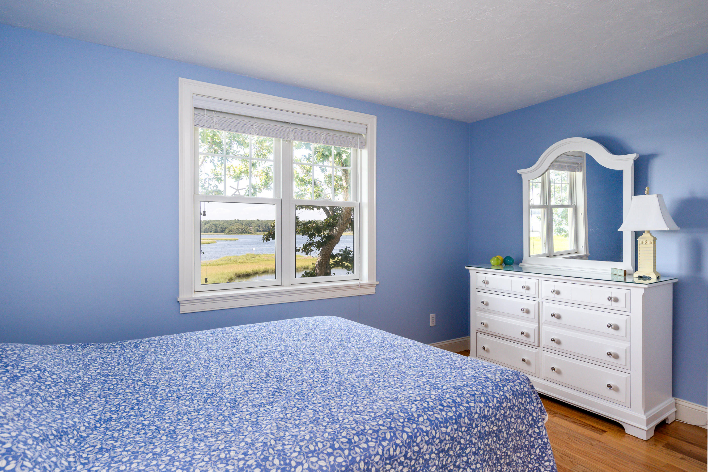 17 Monomoscoy Road West Mashpee, MA 02649 - Photo 15 of 36 a bedroom with a bed and a dresser