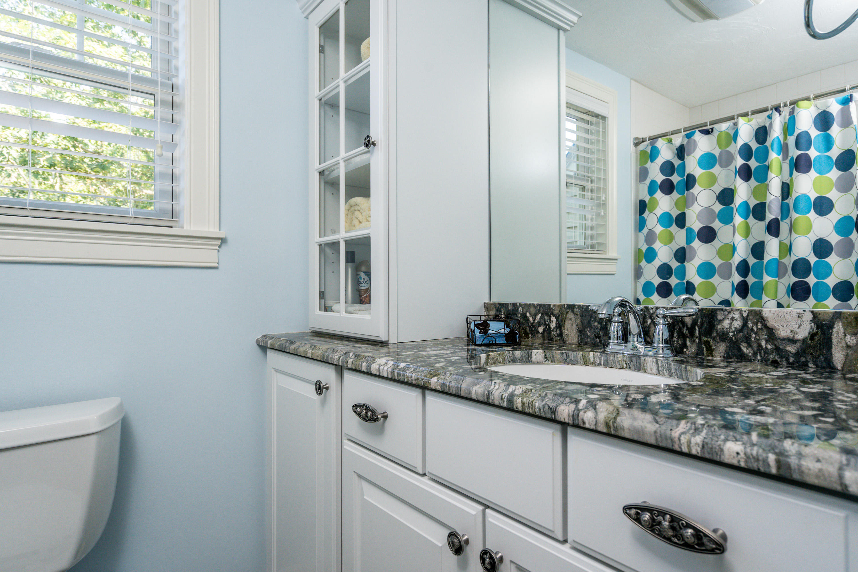 17 Monomoscoy Road West Mashpee, MA 02649 - Photo 19 of 36 a bathroom with a granite countertop sink and a mirror
