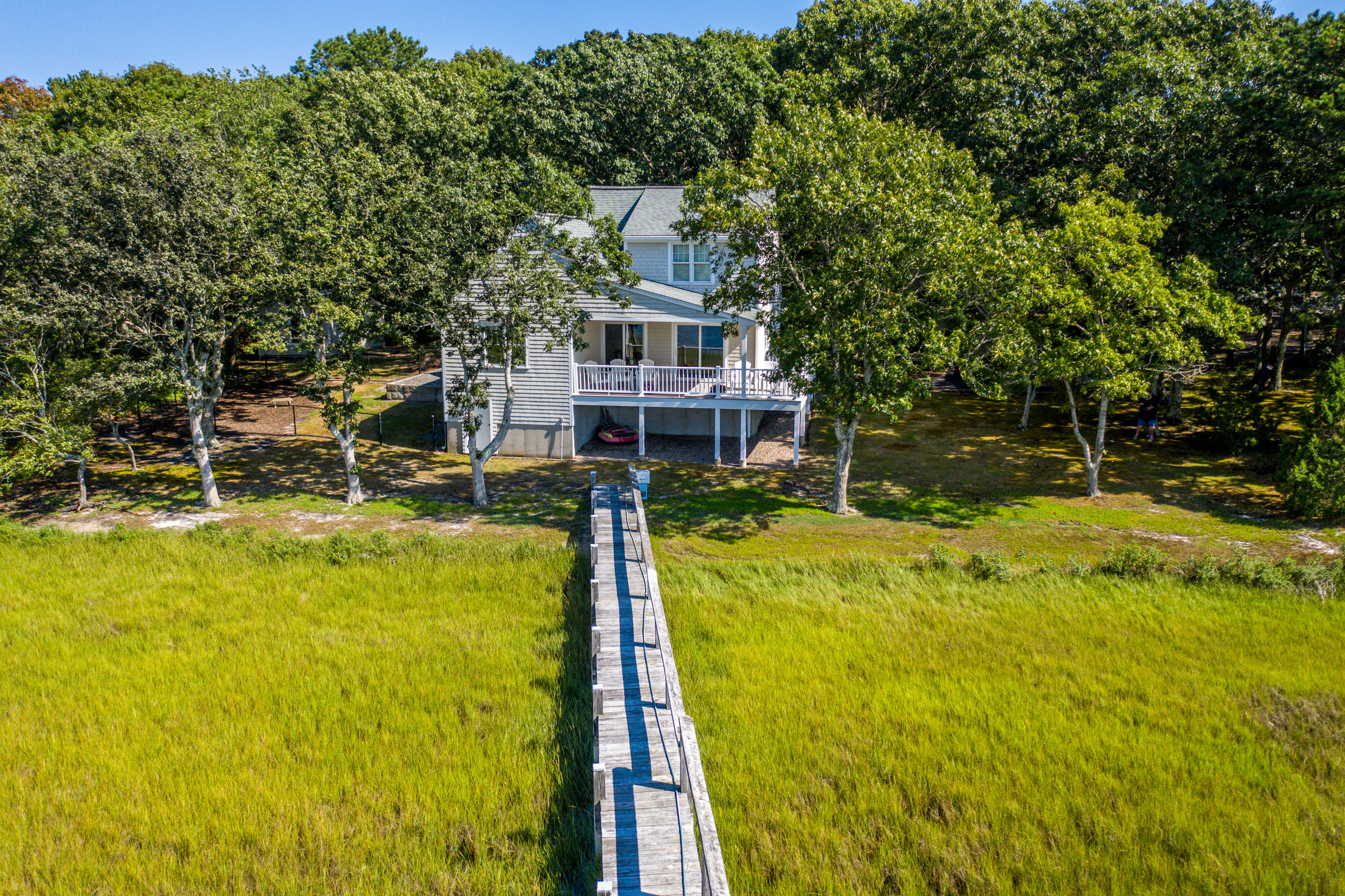 17 Monomoscoy Road West Mashpee, MA 02649 - Photo 20 of 36 a view of a house with pool