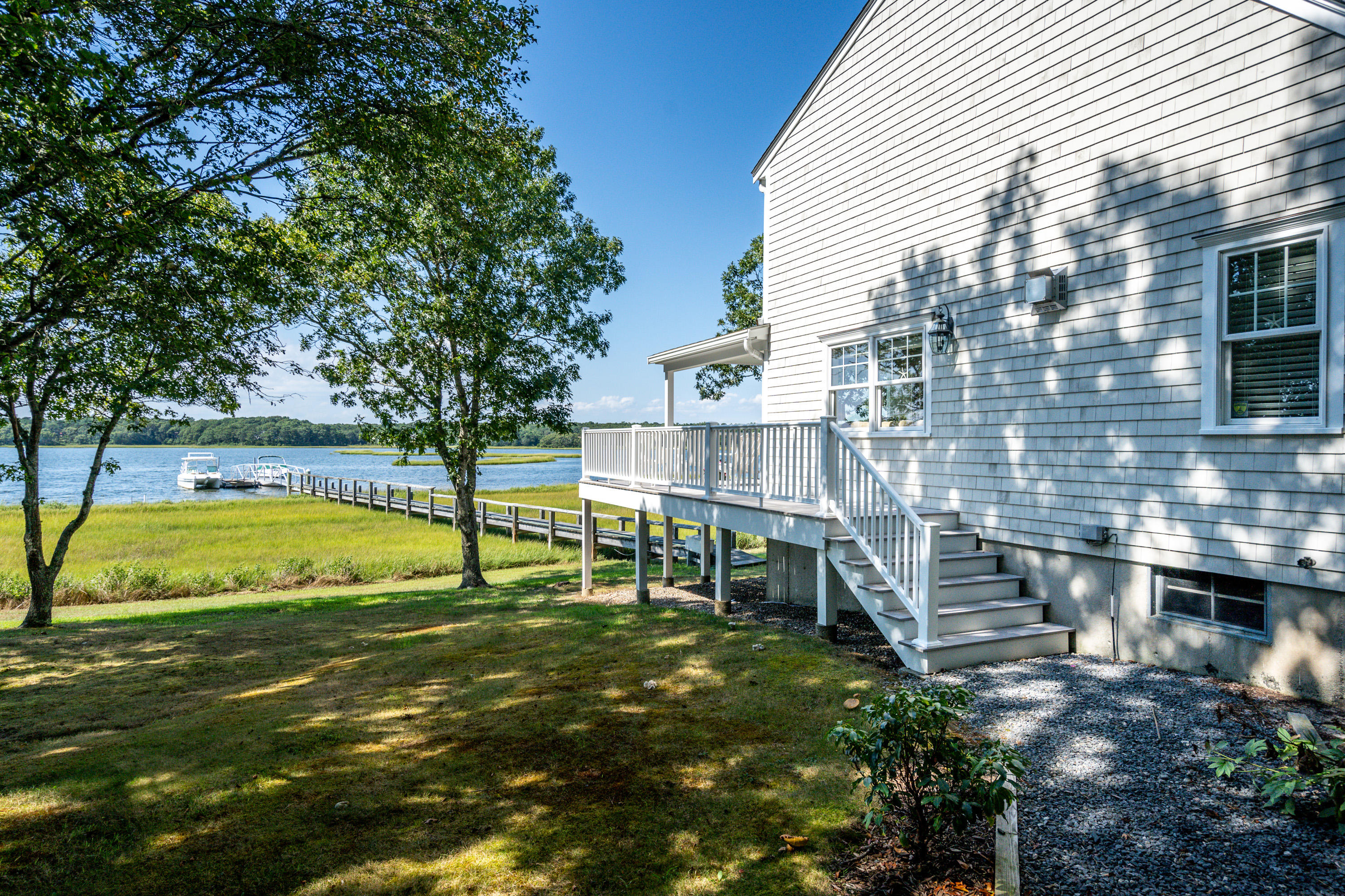 17 Monomoscoy Road West Mashpee, MA 02649 - Photo 32 of 36 a view of swimming pool with outdoor seating and yard