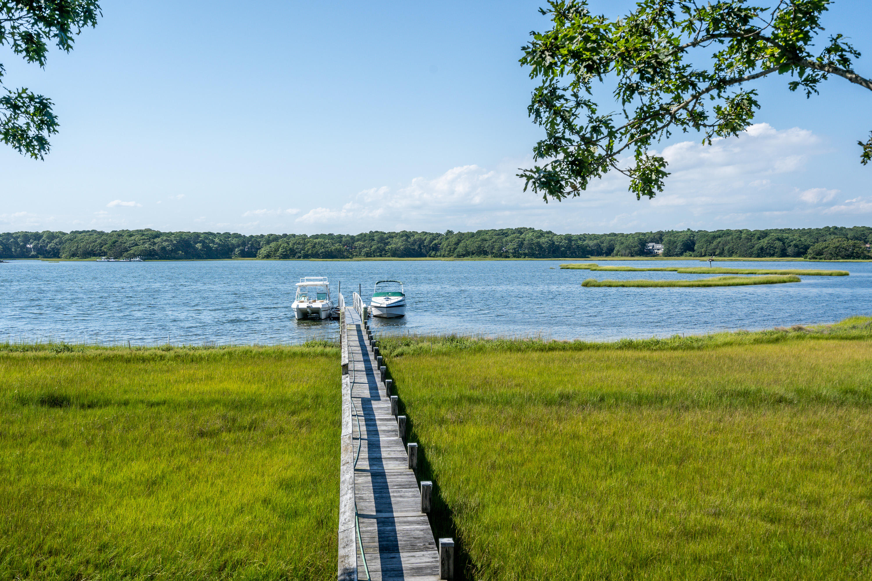 17 Monomoscoy Road West Mashpee, MA 02649 - Photo 33 of 36 a view of a lake with a lake