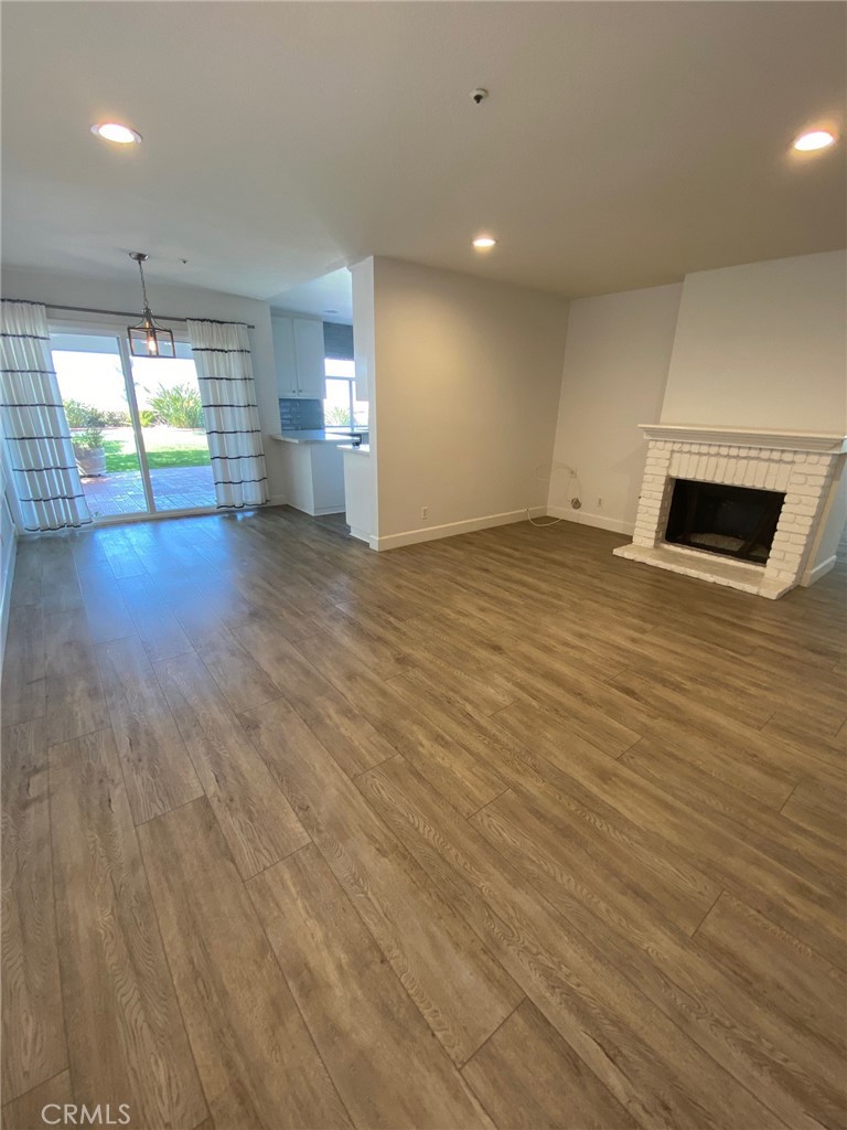 2139 Via Aguila San Clemente, CA 92673 - Photo 11 of 31 an empty room with wooden floor and windows