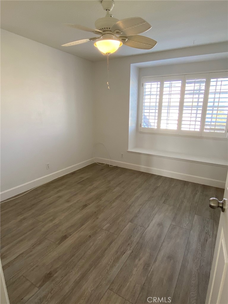 2139 Via Aguila San Clemente, CA 92673 - Photo 19 of 31 wooden floor in an empty room with a window