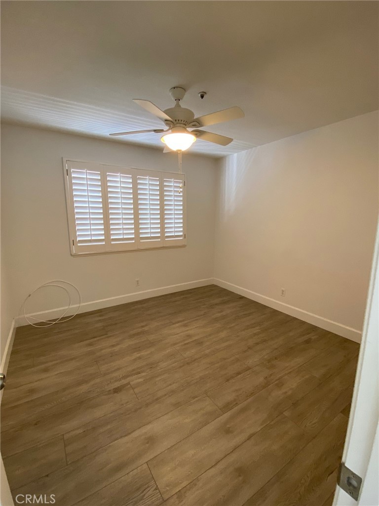 2139 Via Aguila San Clemente, CA 92673 - Photo 23 of 31 wooden floor in an empty room with a window