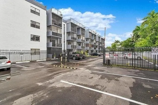 a view of a street with a building