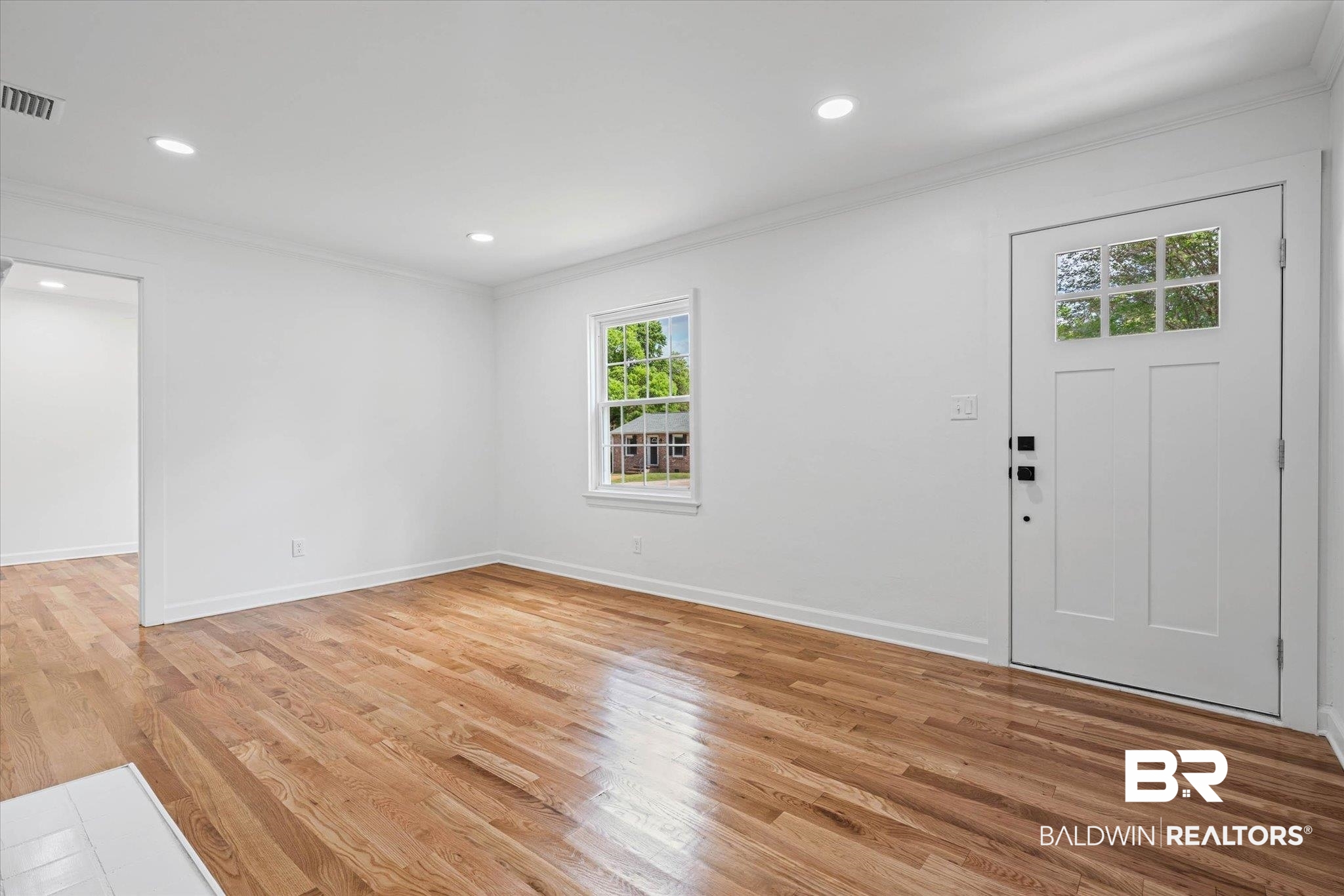 41 Hathaway Road West Mobile, AL 36608 - Photo 3 of 24 Foyer with crown molding, light wood-style flooring, and recessed lighting