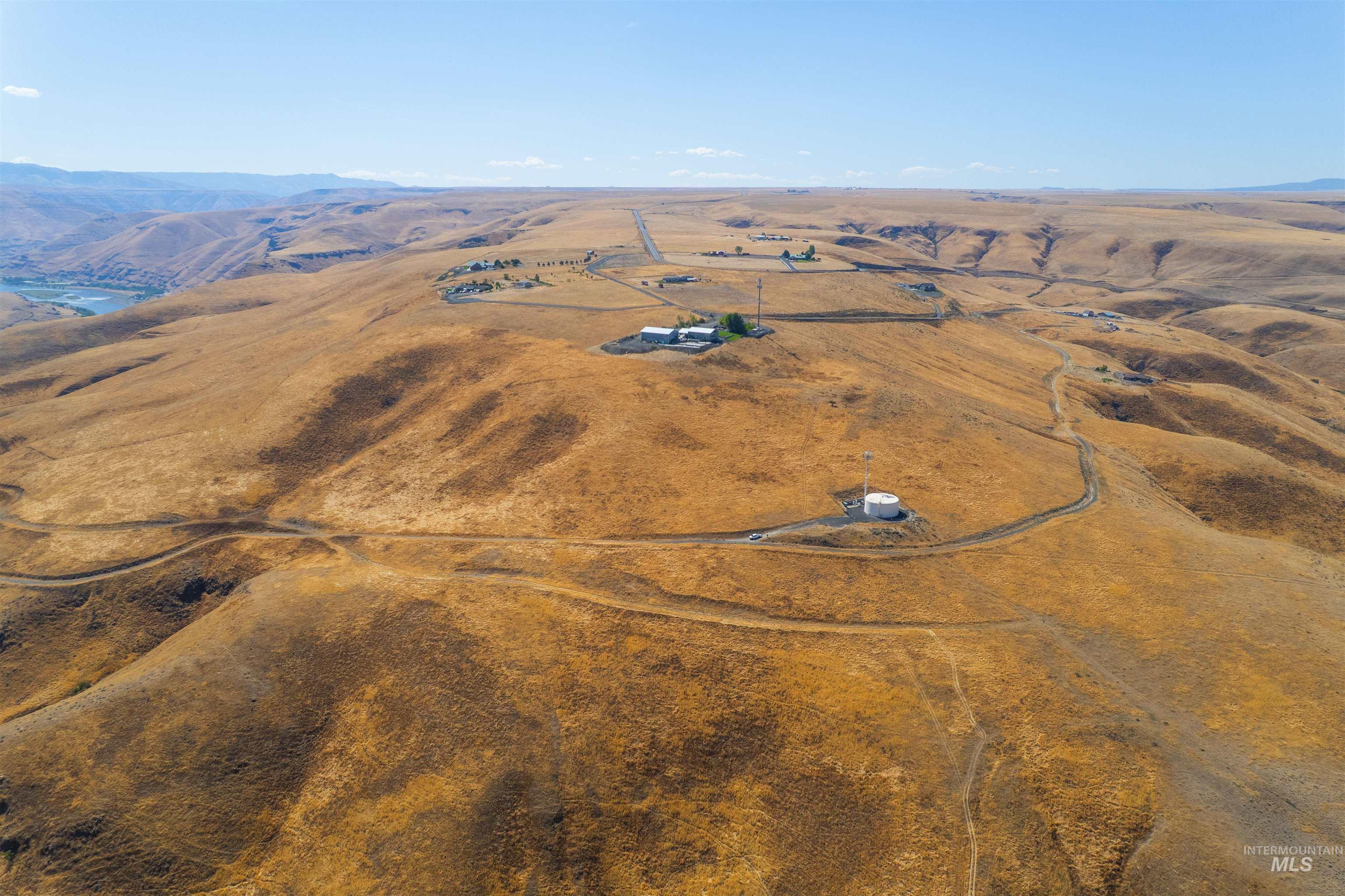 1550 Perro Pointe Road Asotin, WA 99402 - Photo 22 of 50 Overview of rural landscape featuring a mountain backdrop