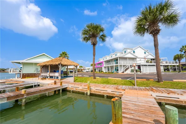 a patio with table and chairs