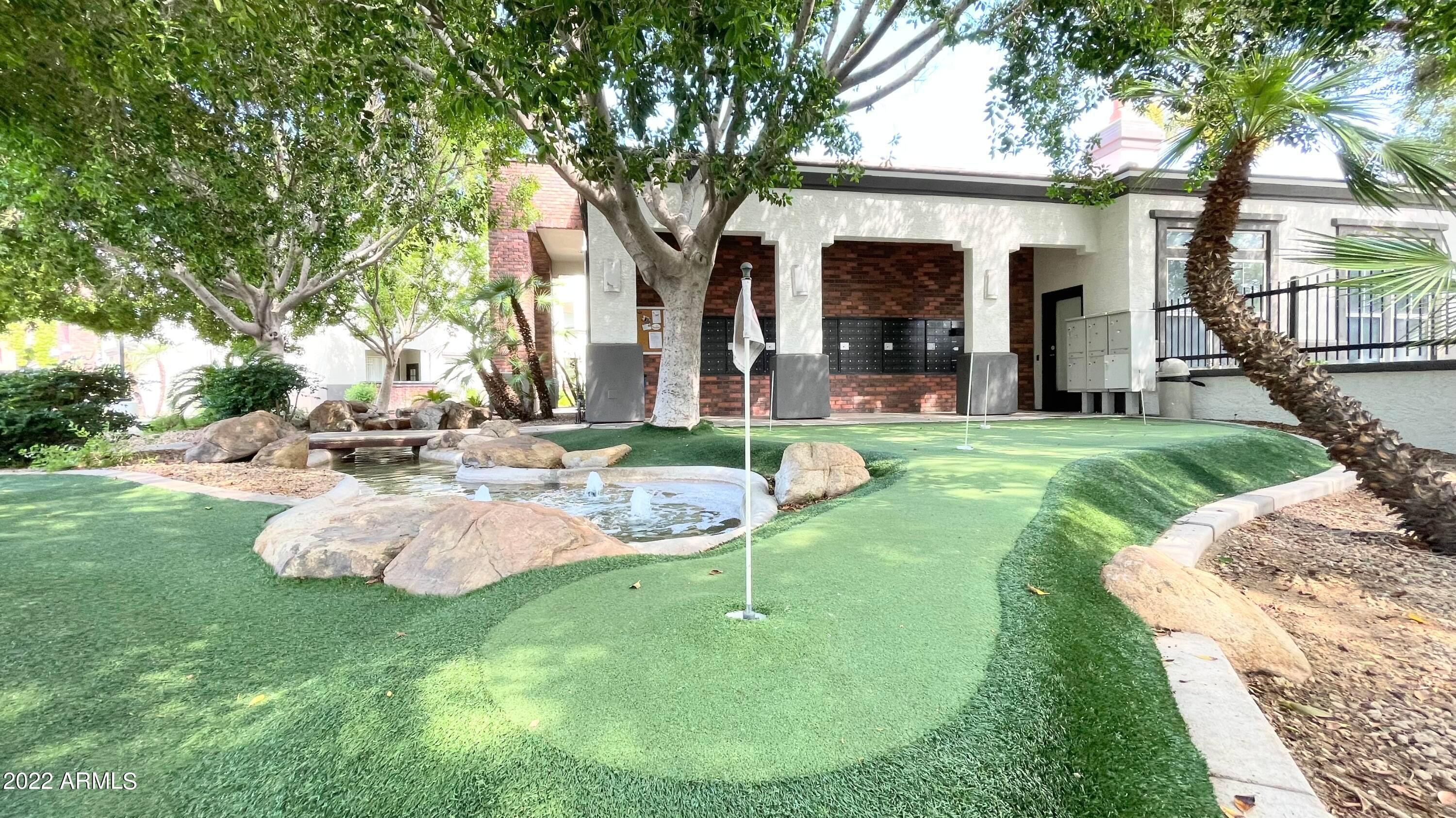 3302 North 7th Street, Unit 222 Phoenix, AZ 85014 - Photo 2 of 30 a view of a house with backyard and sitting area
