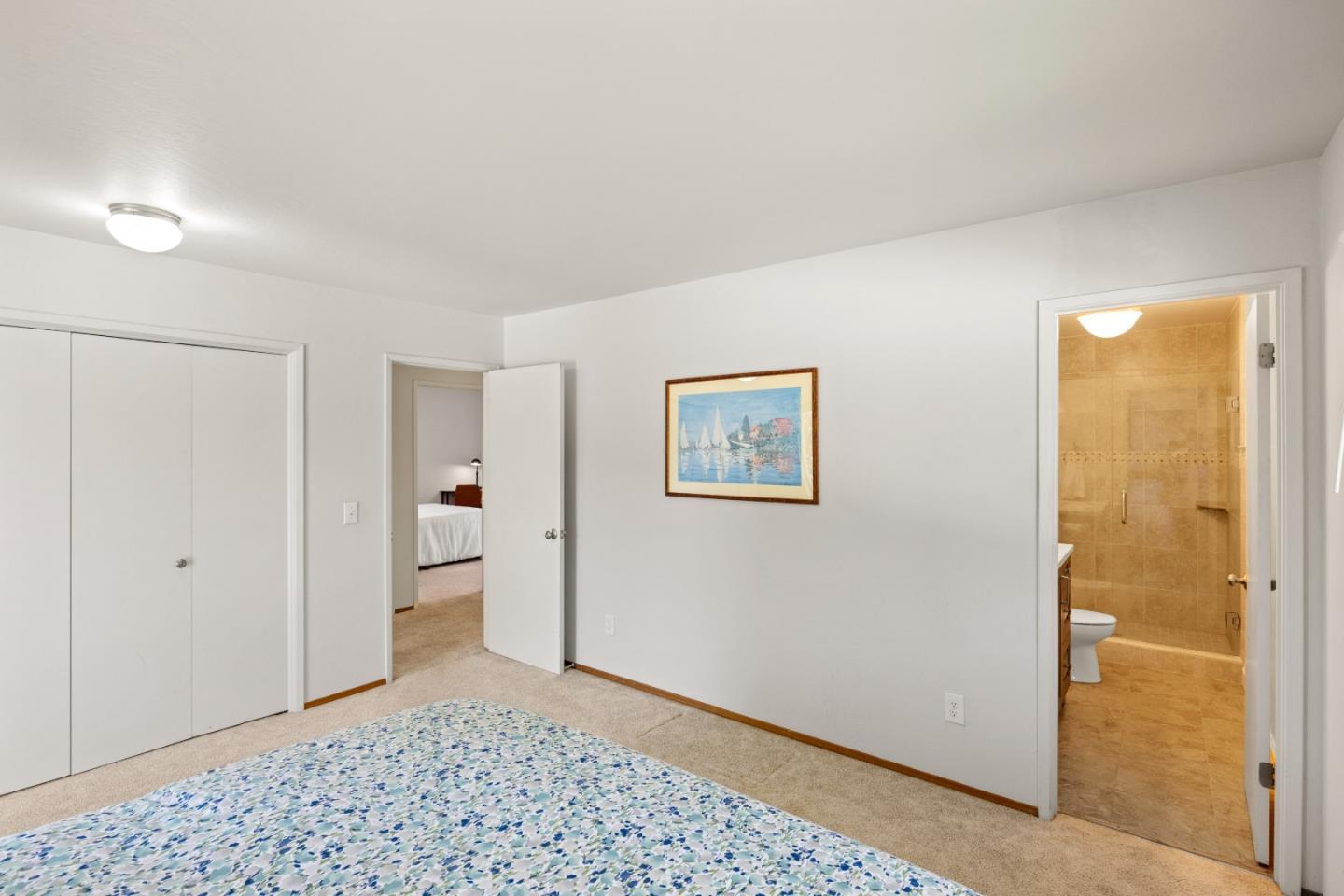 902 Maple Street Pacific Grove, CA 93950 - Photo 17 of 35 a view of a hallway with closet