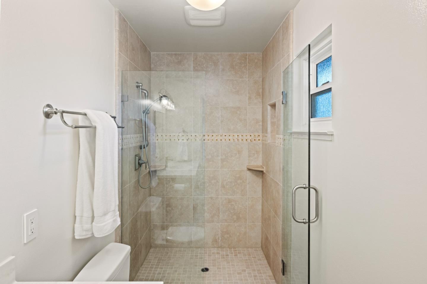 902 Maple Street Pacific Grove, CA 93950 - Photo 18 of 35 a bathroom with a shower and a toilet