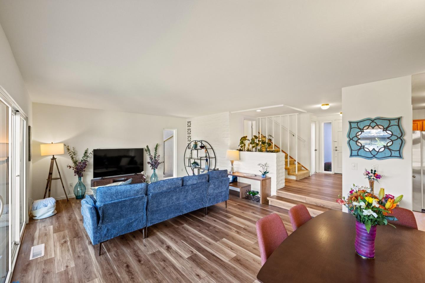 902 Maple Street Pacific Grove, CA 93950 - Photo 7 of 35 a living room with furniture and a flat screen tv