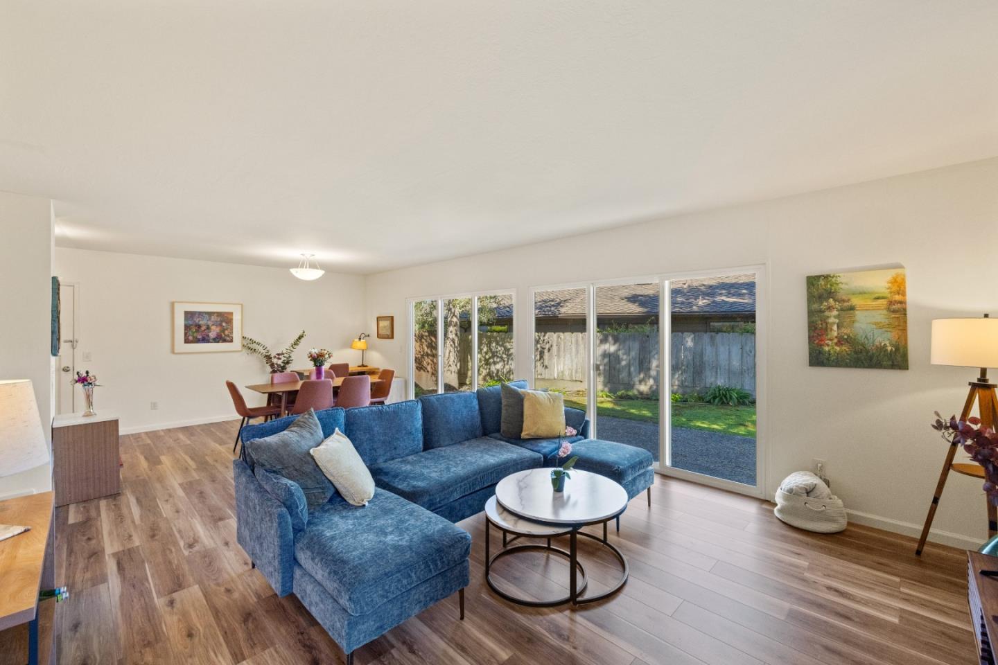 902 Maple Street Pacific Grove, CA 93950 - Photo 8 of 35 a living room with furniture and a wooden floor