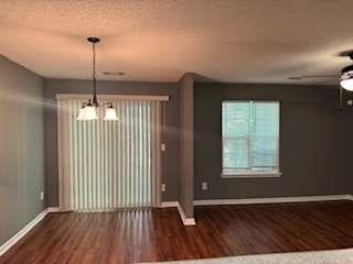 6213 Hickory Ln Circle Union City, GA 30291 - Photo 3 of 15 a view of an empty room with wooden floor and a window