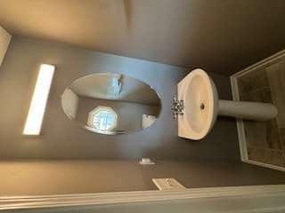 6213 Hickory Ln Circle Union City, GA 30291 - Photo 5 of 15 a bathroom with a sink and a mirror