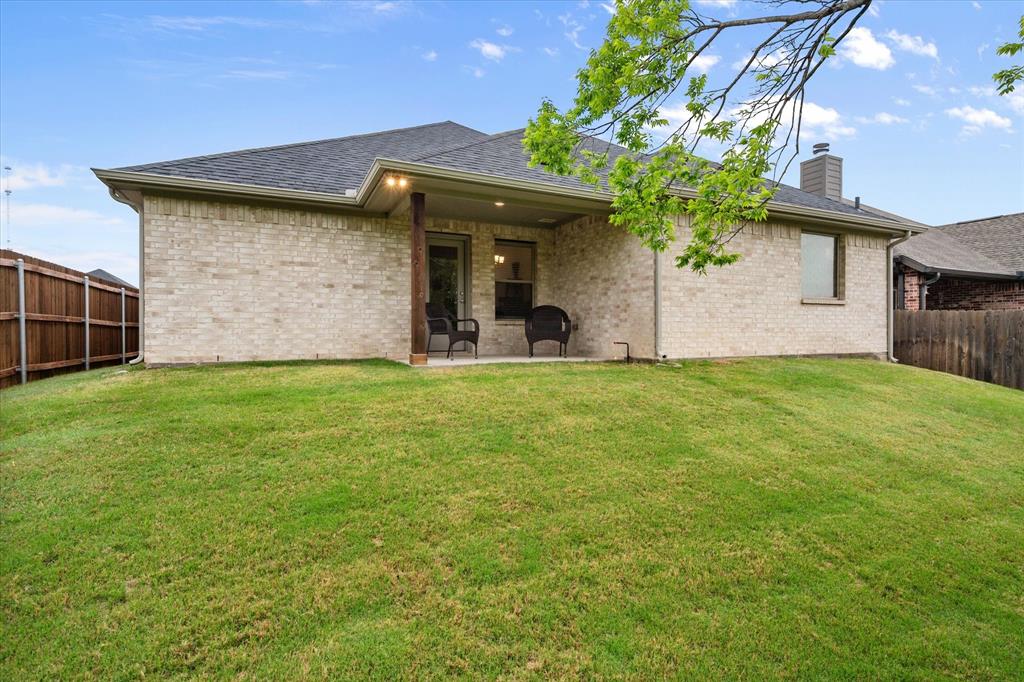 103 Randal Row Corsicana, TX 75110 - Photo 32 of 35 a view of a house with a yard