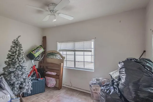 a view of a house with a yard and garage