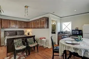a view of a dining room with furniture