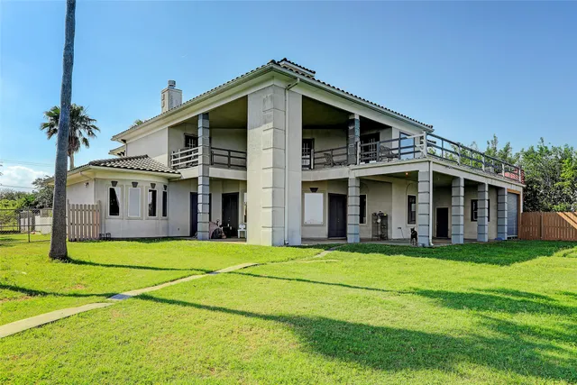 a view of a house with swimming pool