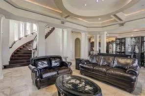 a living room with furniture and a couch