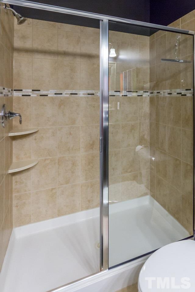 1655 Crafton Way Raleigh, NC 27607 - Photo 17 of 25 a bathroom with a shower