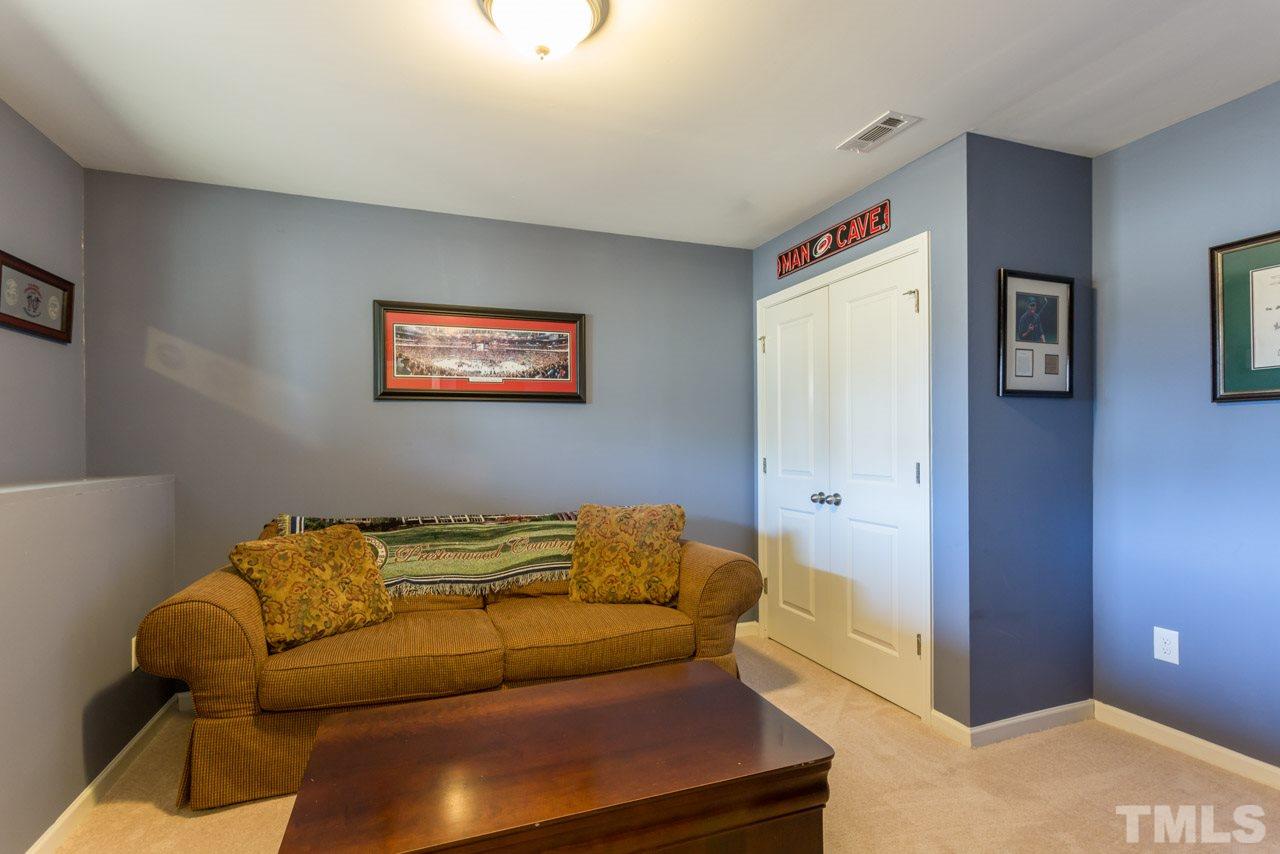 1655 Crafton Way Raleigh, NC 27607 - Photo 21 of 25 a living room with furniture
