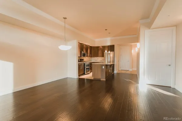 a view of kitchen with wooden floor