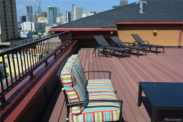 a view of a balcony with chairs