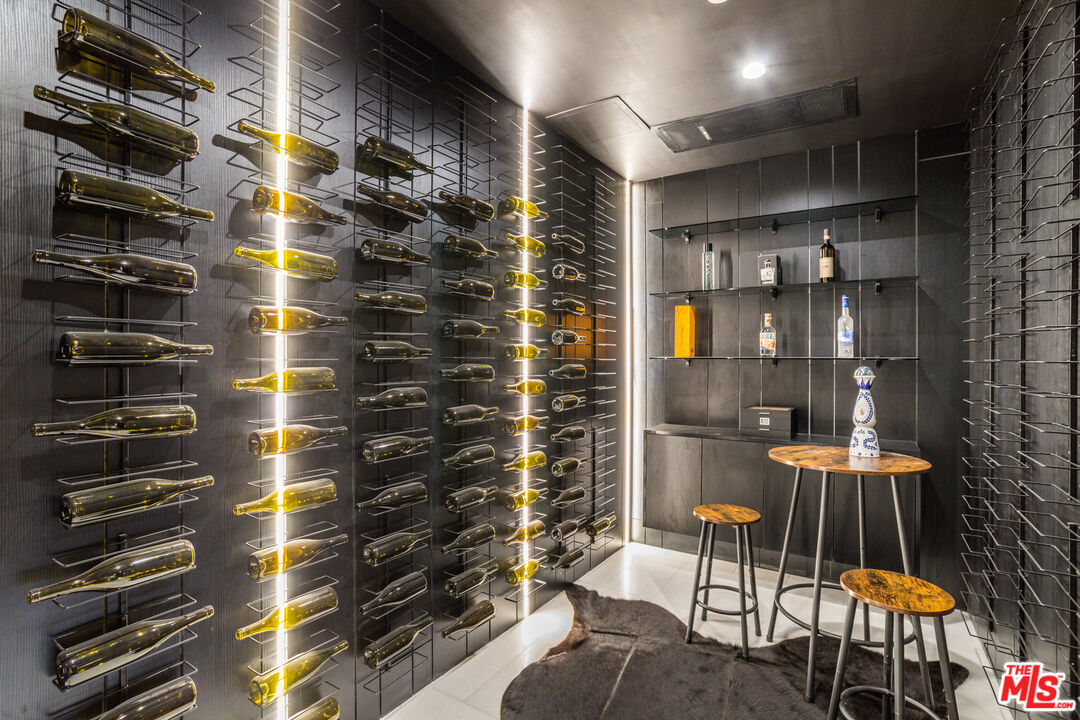 9406 Lloydcrest Drive Beverly Hills, CA 90210 - Photo 20 of 52 a bathroom with a sink and a shower