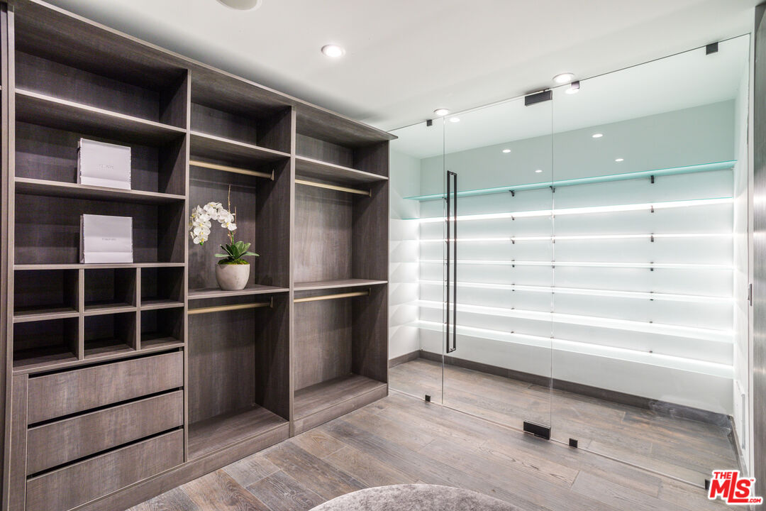 9406 Lloydcrest Drive Beverly Hills, CA 90210 - Photo 32 of 52 a view of an empty walk in closet