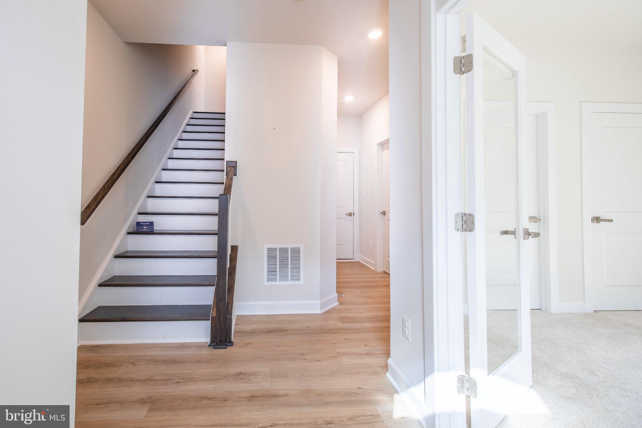 5313 8th Road South Arlington, VA 22204 - Photo 8 of 50 Bright entryway with modern staircase.