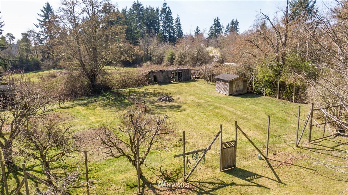 18101 Beall Road Southwest Vashon, WA 98070 - Photo 5 of 37 a view of back yard of the house