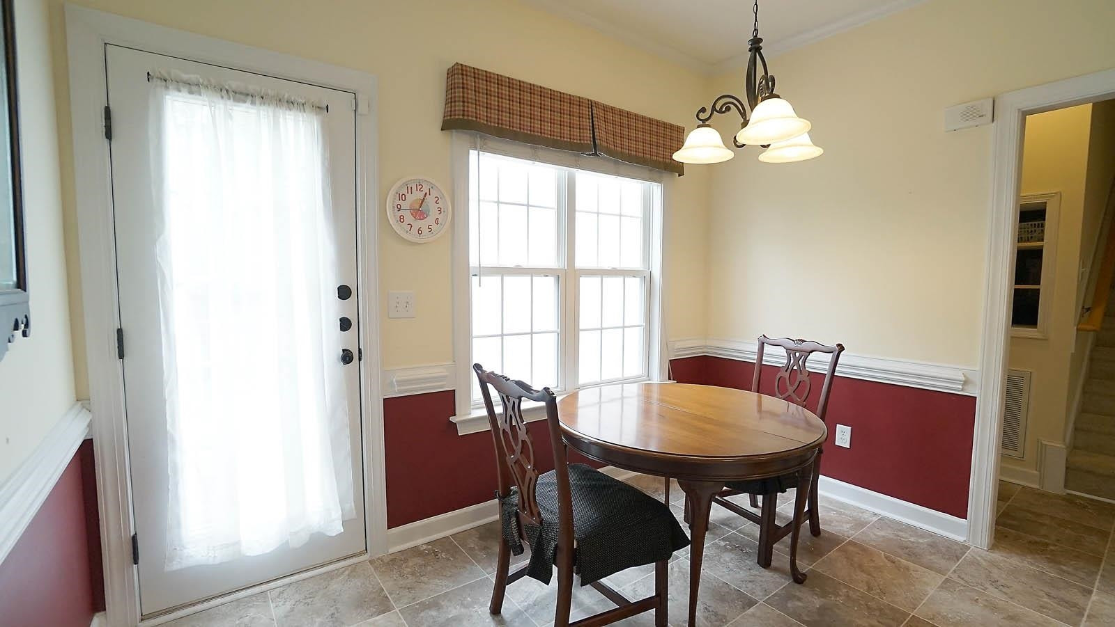 318 Jamison Drive Raleigh, NC 27610 - Photo 7 of 24 *Sunny Breakfast Nook*French Door to the Deck and Backyard*
