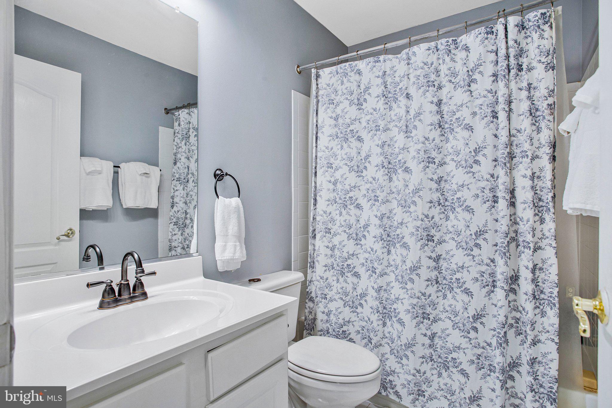 1582 Snug Harbor Road Shady Side, MD 20764 - Photo 41 of 53 Charming bathroom with floral accents.