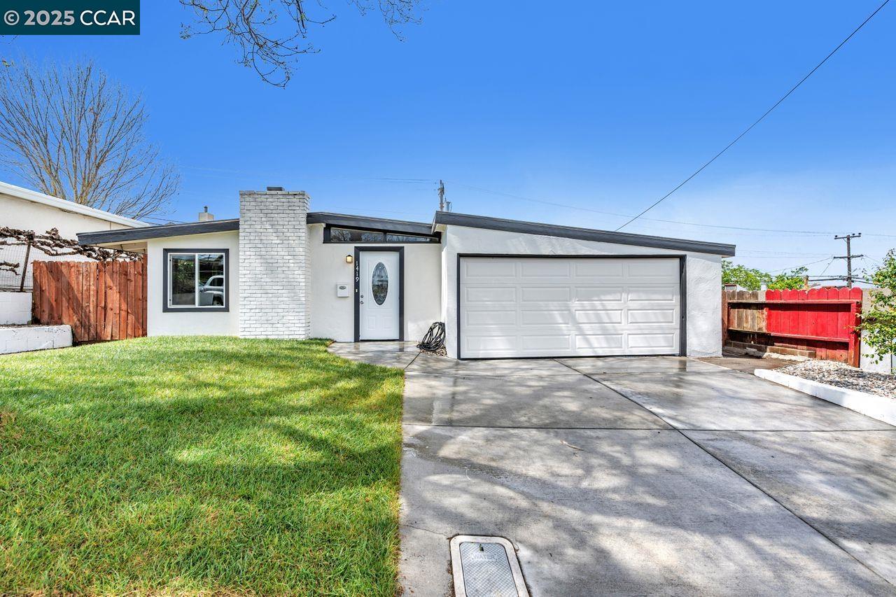 1419 Coronel Avenue Vallejo, CA 94591 - Photo 1 of 1 a view of an house with backyard and garage