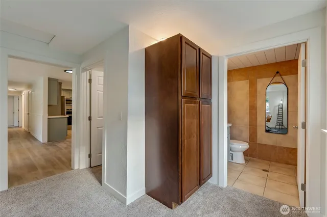 a view of bathroom with a glass door shower