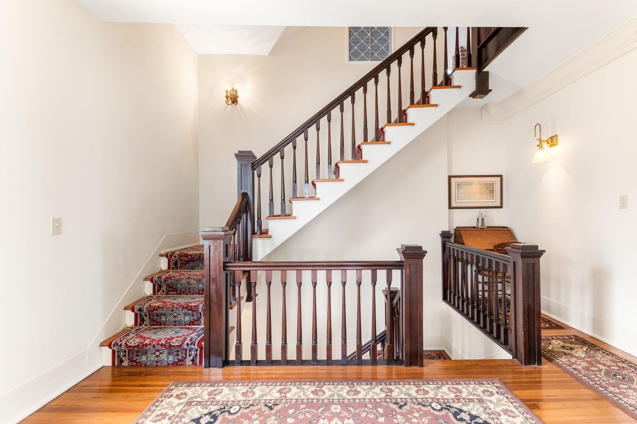 178 Avenida Menendez St. Augustine, FL 32084 - Photo 29 of 42 a view of staircase with railing and white walls