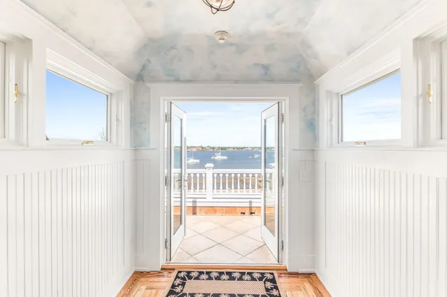 a view of balcony with furniture
