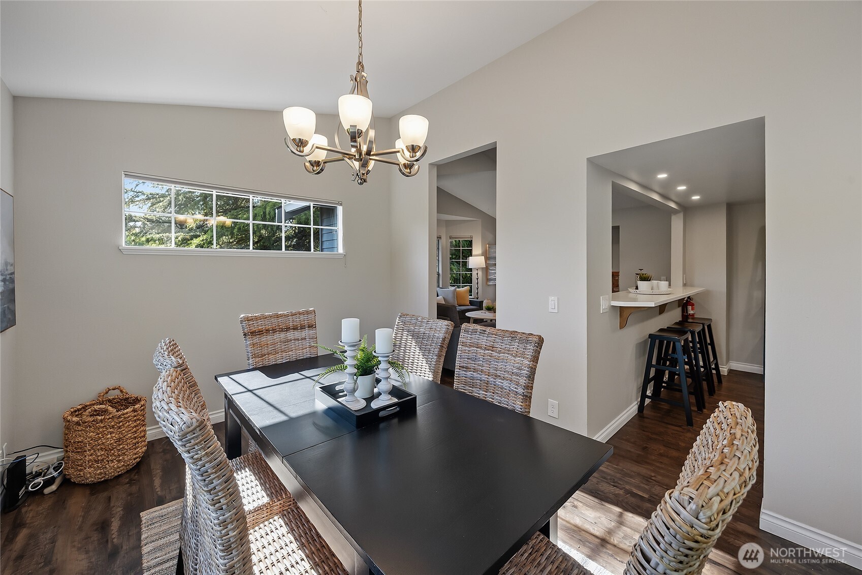 23707 Meridian Place West Bothell, WA 98021 - Photo 9 of 40 a view of a dining room with furniture a chandelier and wooden floor