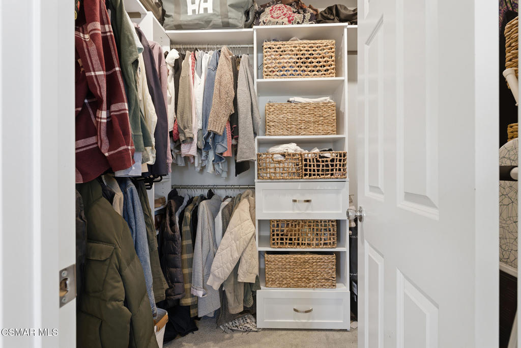 512 Mulberry Lane Fillmore, CA 93015 - Photo 36 of 54 a view of walk in closet with clothes and shoes