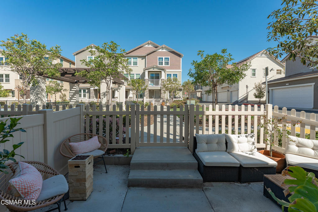 512 Mulberry Lane Fillmore, CA 93015 - Photo 4 of 54 a view of a patio with couches table and chairs and potted plants